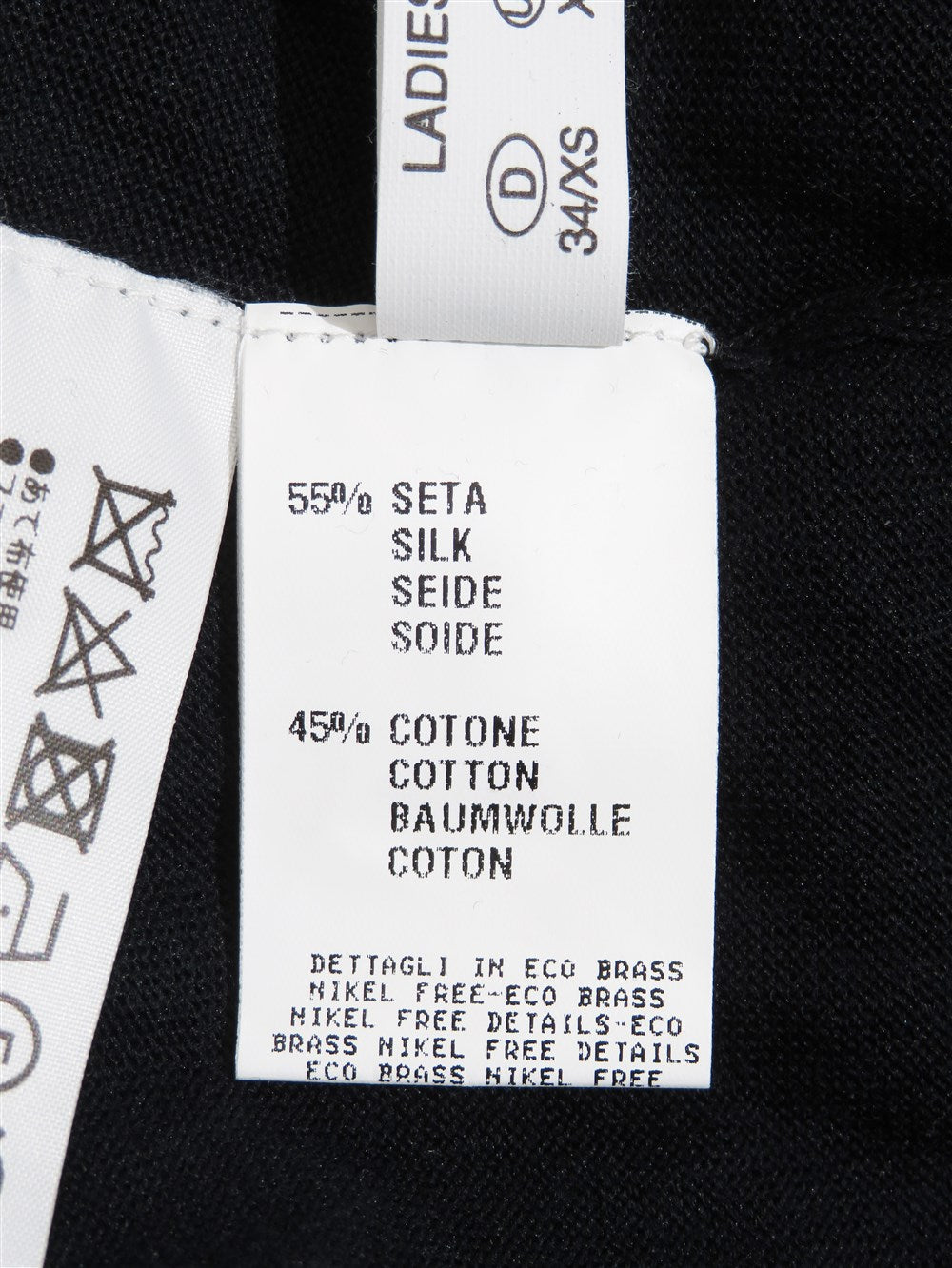 フラワーコサージュ付き Vネック プルーバー